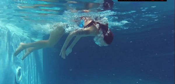  Pornstar Mia Ferrari in blue bikini underwater